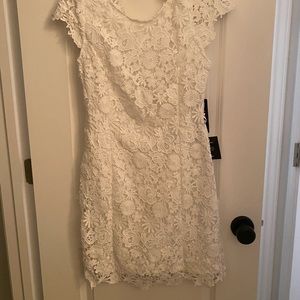 White Lulu’s dress. Perfect for a bride to wear to all of her wedding events!